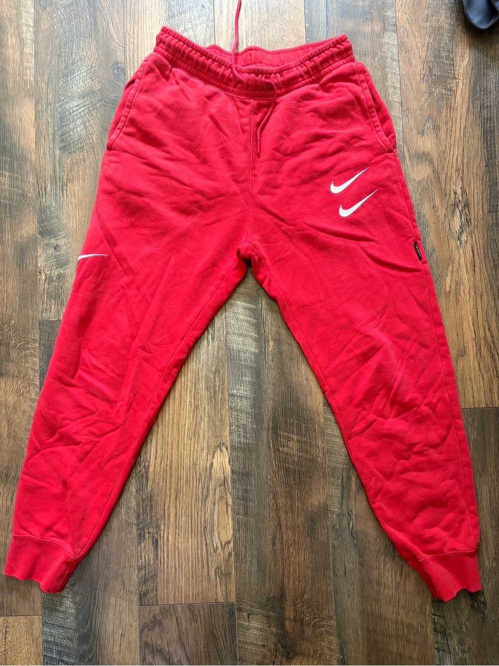 Nike Kids Red Fleece Joggers with White Swoosh